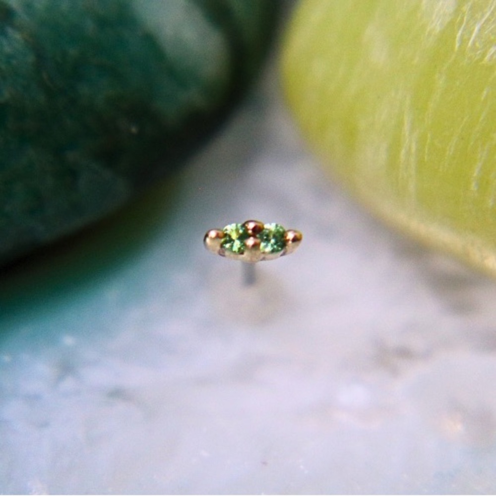 BJO Mishka tsavorite in yellow gold press fit piercing jewelry